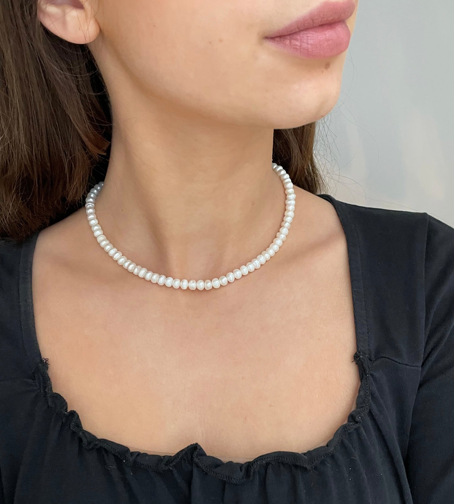 White button pearl necklace