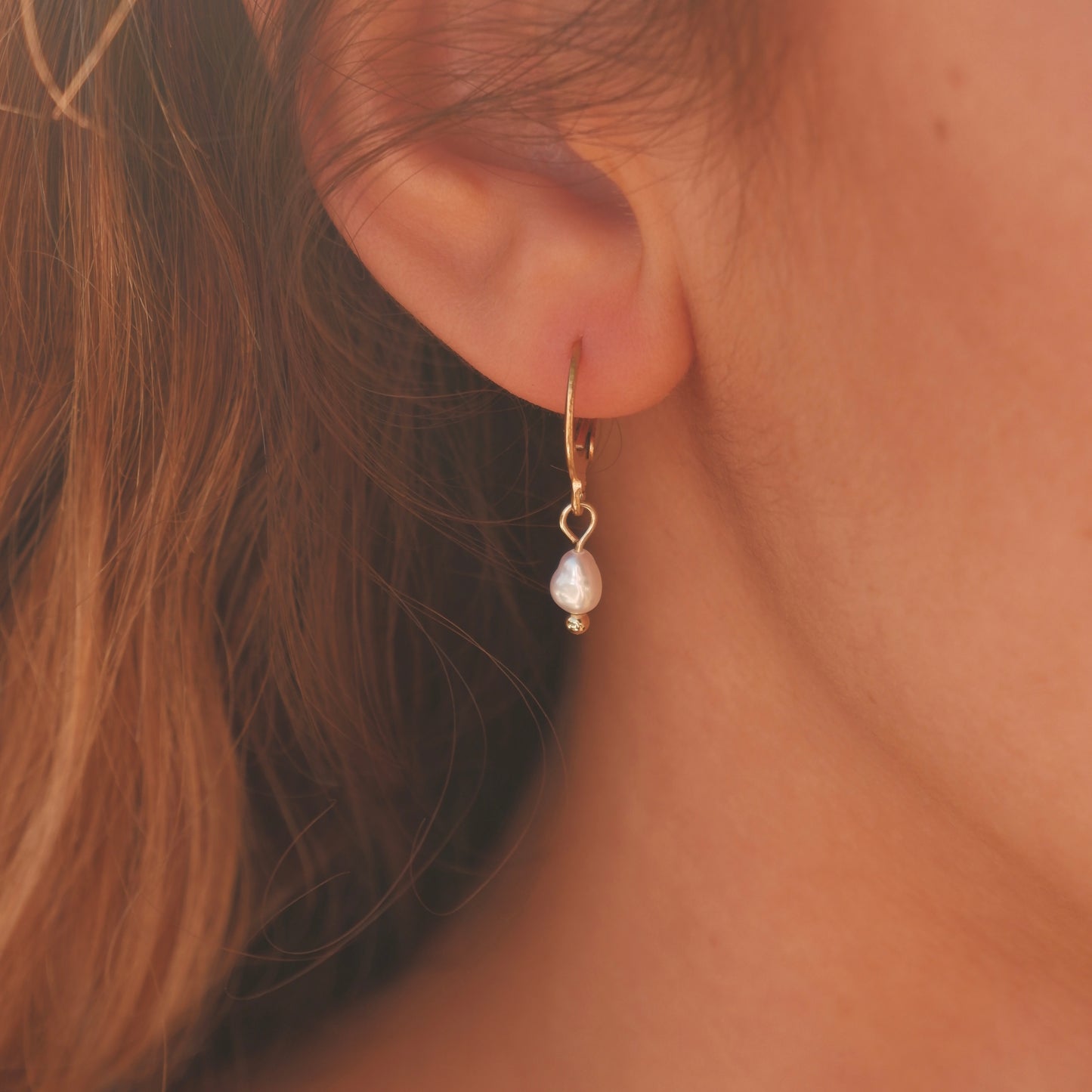 Single pearl earrings