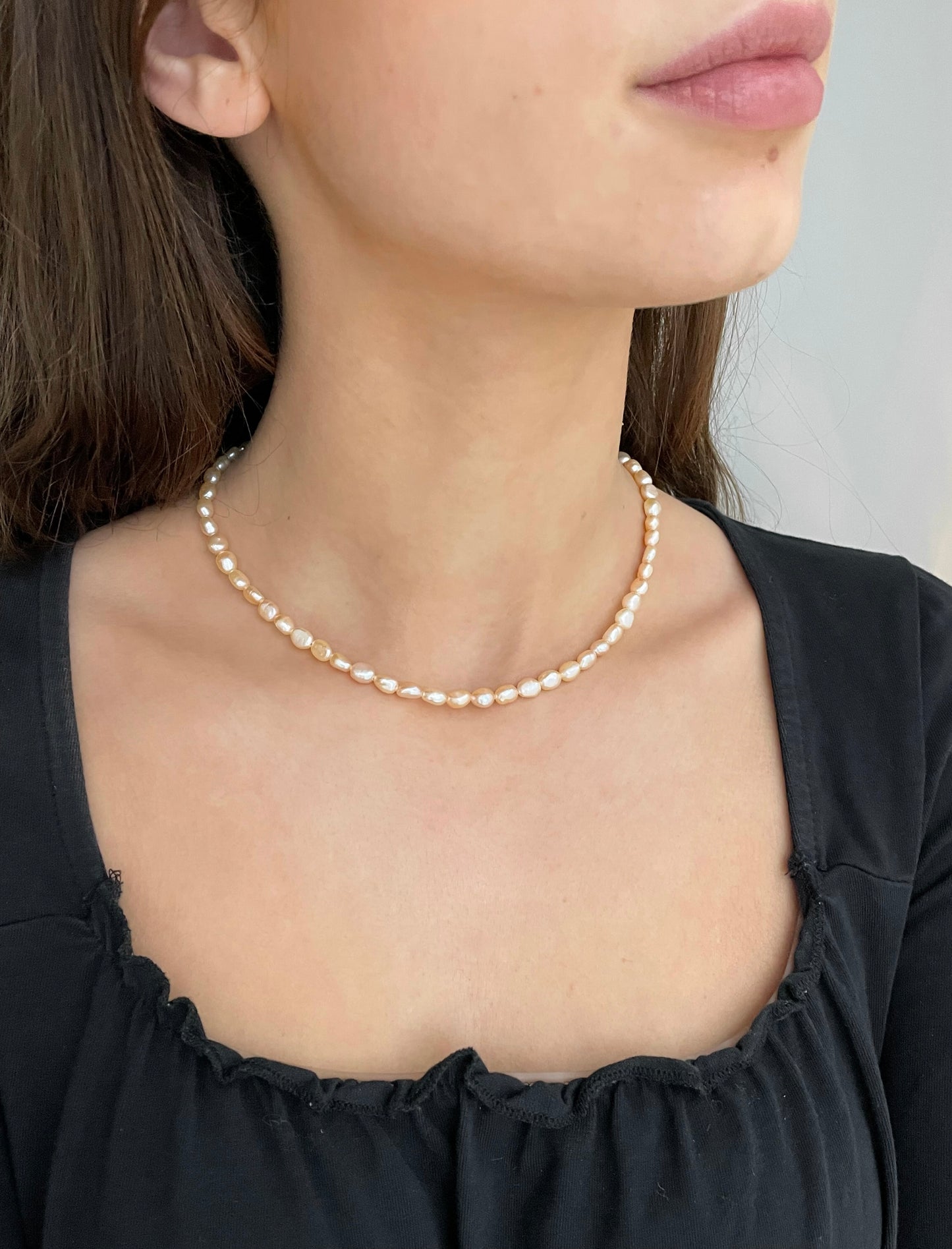 Peachy pink pearl necklace