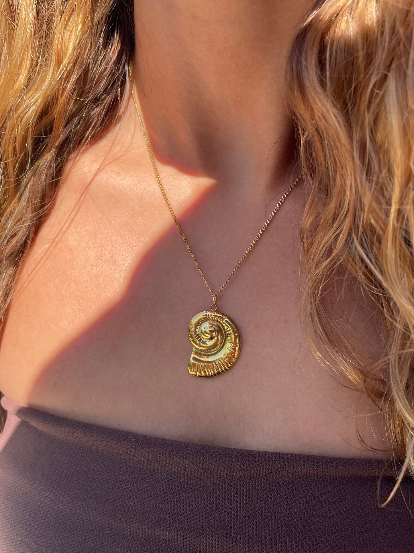 Golden spiral shell necklace