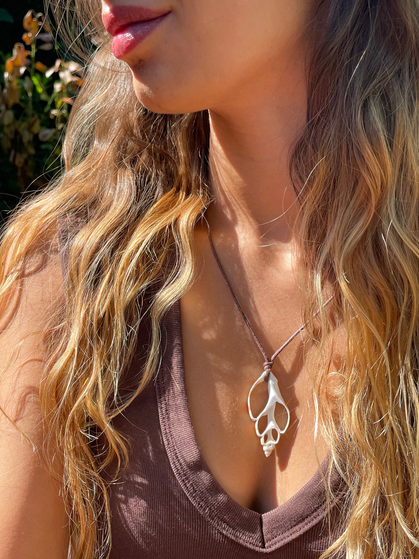 Adjustable spiral shell necklace