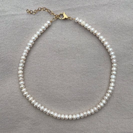 White button pearl necklace