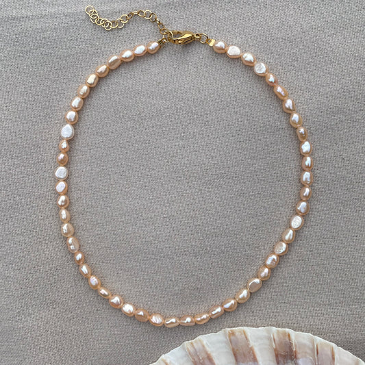Peachy pink pearl necklace