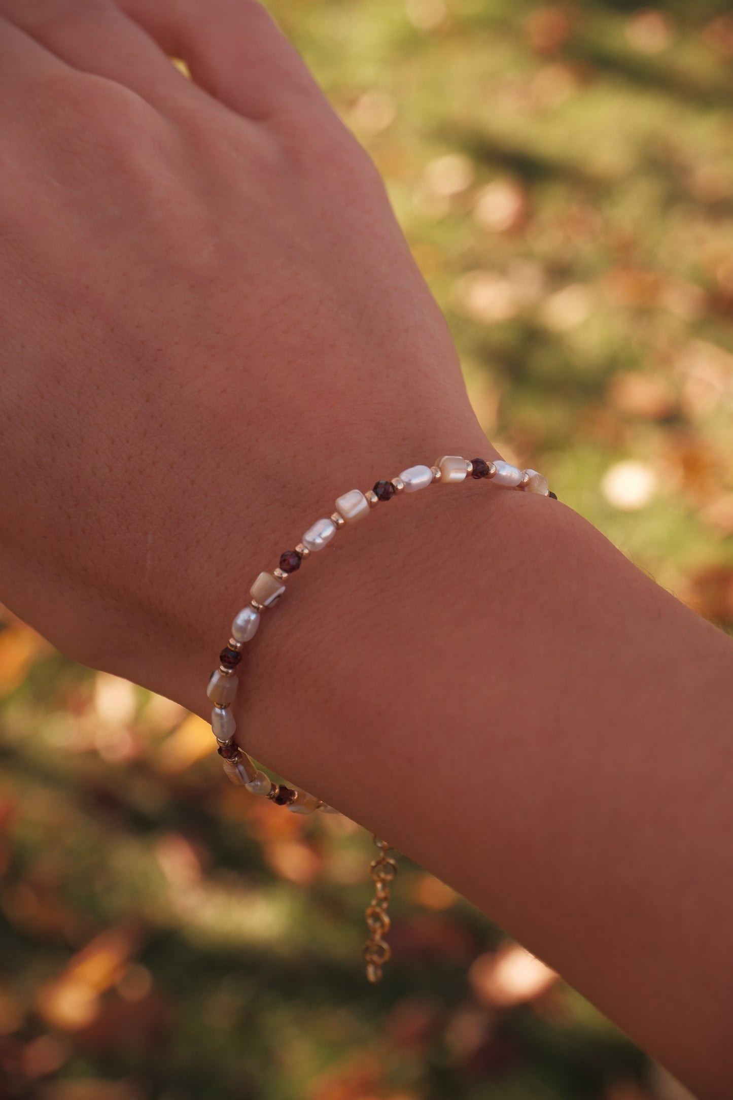Garnet and shell bracelet