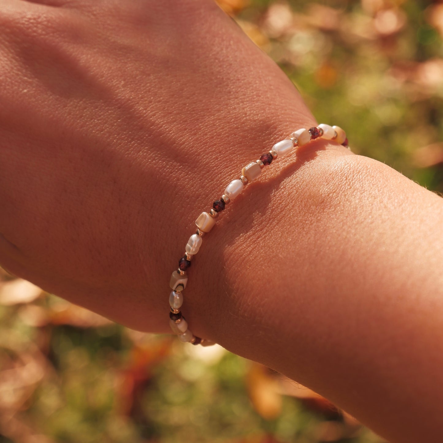 Garnet and shell bracelet