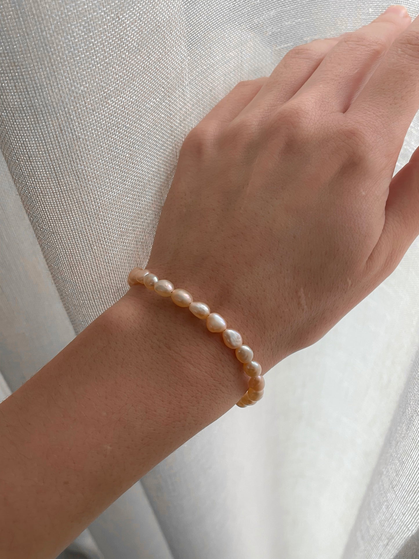 Peachy pink pearl bracelet