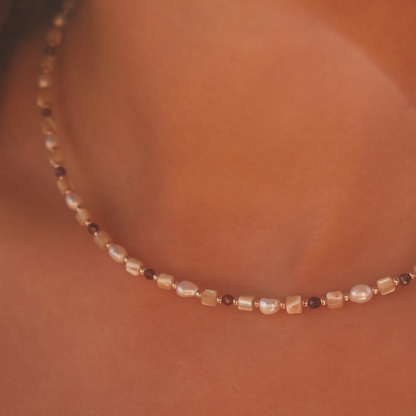 Garnet and shell necklace