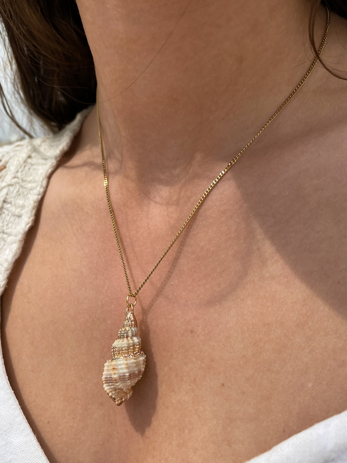 Spiral shell necklace